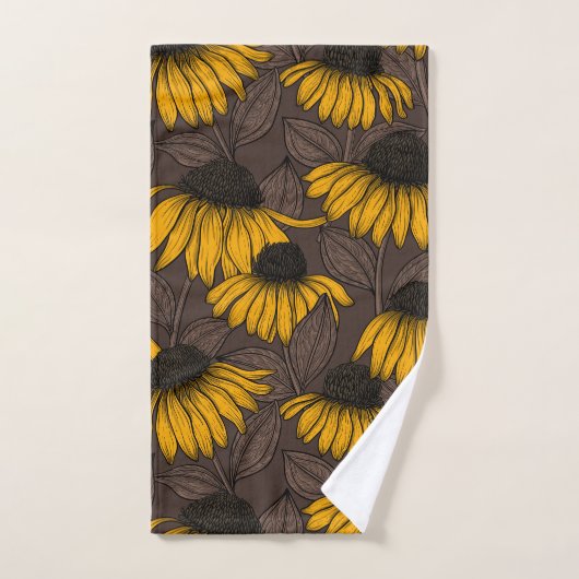 Gele condensors op donkerbruin bad handdoek (Handdoek)