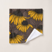 Gele condensors op donkerbruin bad handdoek (Wasdoekje)