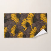 Gele condensors op donkerbruin bad handdoek (Handdoek)