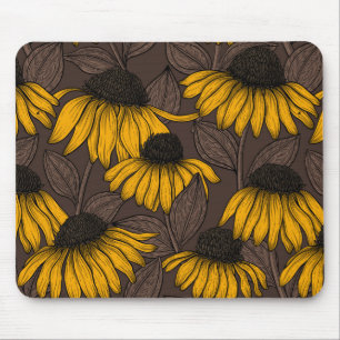 Gele condensors op donkerbruin muismat