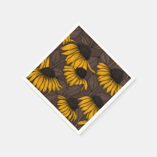 Gele condensors op donkerbruin servet (Hoek)