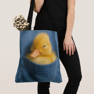 Gele Eend in een Blauwe T-shirt Zak Tote Bag