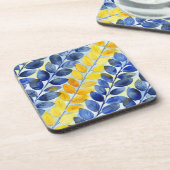 Gele en blauwe bladeren bier onderzetter (Linkerzijde)
