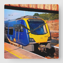 Gele en blauwe trein vierkante klok