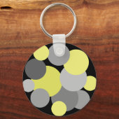 Gele en grijze pokadots sleutelhanger (Voorkant)