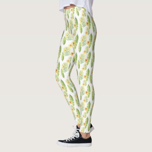 Gele en groene tropische bladeren en bloemen leggings (Links)