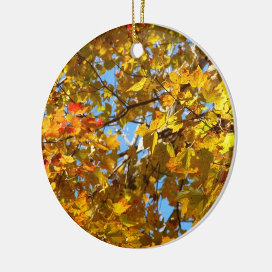 Gele esdoornbladeren en blauwe lucht keramisch ornament (Links)