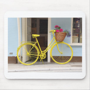 gele fiets en bloemmandje muismat