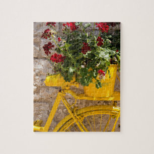 Gele fiets legpuzzel