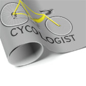 Gele fiets met cycoloog tekst op grijs cadeaupapier (Rol Hoek)