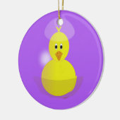 Gele griet op paars keramisch ornament (Links)