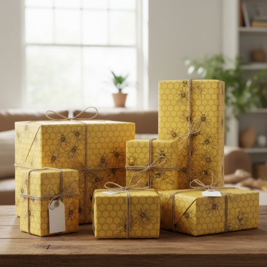 Gele honingbij en honingraat cadeaupapier