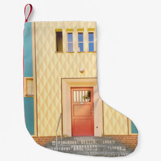Gele huisillustratie kleine kerstsok