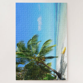 Gele kajak op een wit strand met palm legpuzzel