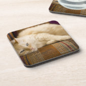  gele kattenpoot op de bank. drankjes onderzetter (Linkerzijde)