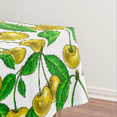 Gele kersen op wit tafelkleed (Voorbeeld)