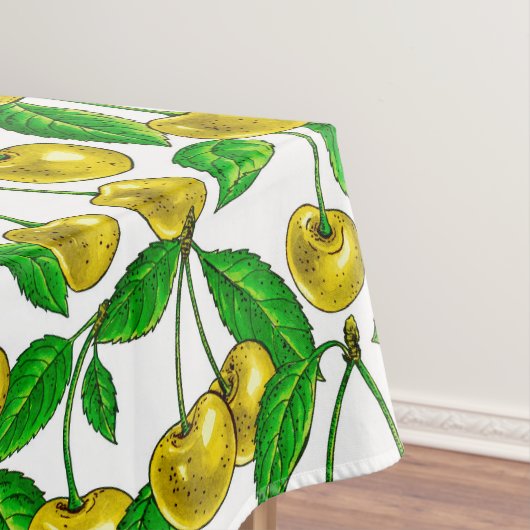 Gele kersen op wit tafelkleed (Voorbeeld)