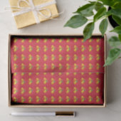 Gele kerstklokken op rode tissuepapier (Geschenk)