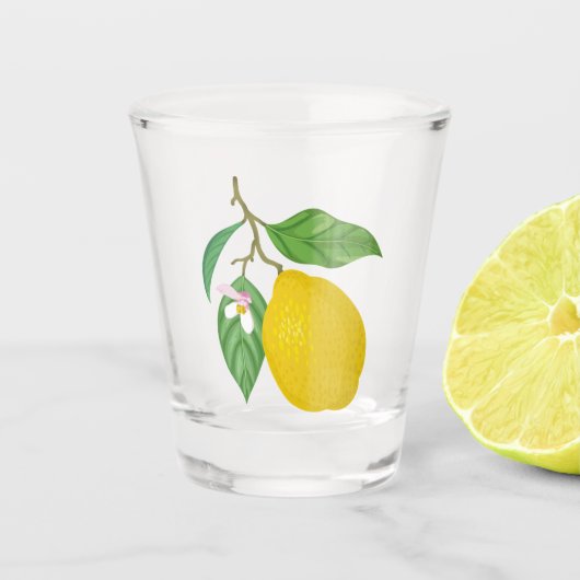 Gele leemon met groene bladeren en witte ventilato shot glas (Voorkant)