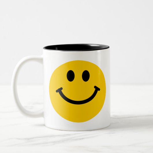 Gele mok met gelukkig gezicht (Links)