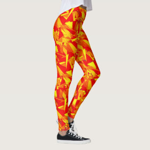 Gele, oranje rode driehoeken en schijngeometrische leggings