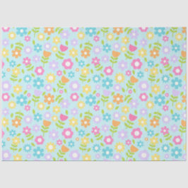 Gele, paarse, blauwe en roze bloemen op blauw tissuepapier