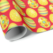 Gele paaseieren op rood cadeaupapier (Rol Hoek)