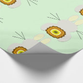 Gele paashaas op groen inpakpapier (Hoek)