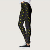 Gele polka stip op zwarte leggings (Links)