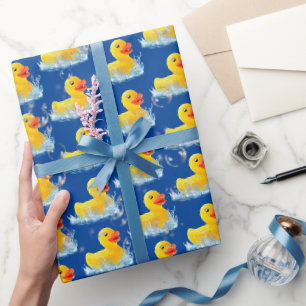 Gele rubber eenden met belletjes cadeaupapier