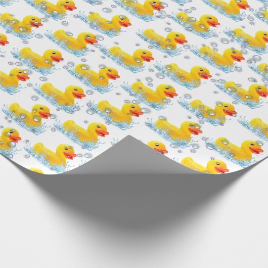 Gele rubber eenden met belletjes cadeaupapier (Hoek)