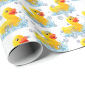 Gele rubber eenden met belletjes cadeaupapier (Rol Hoek)