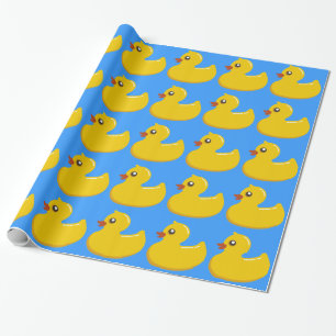gele rubbereend in blauw cadeaupapier