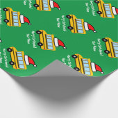 Gele schoolbus met kerstmuts cadeaupapier (Hoek)