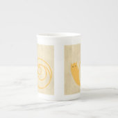 Gele slak op de achtergrond van Cream Porselein Kop (Voorkant)