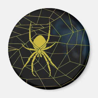 Gele spin in web, webbing magneet
