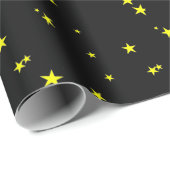 Gele sterren op zwart cadeaupapier (Rol Hoek)