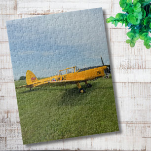 Gele vliegtuigfoto familienacht legpuzzel