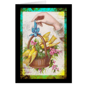 Gele vogels in een mandje