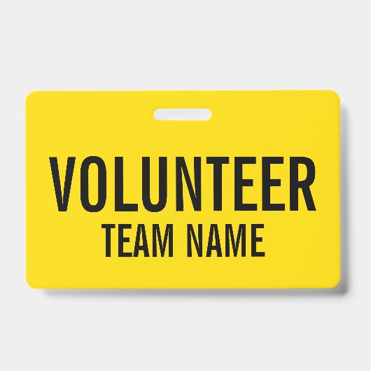 Gele vrijwilligersbadge met de naam van het team v badge (Voorzijde)