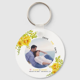 Gele waterverf bloemen, groene bladeren en foto sleutelhanger