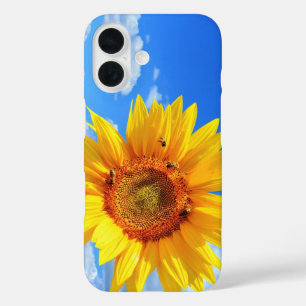 Gele zonnebloem en bijen op blauwe hemel iPhone 16 hoesje