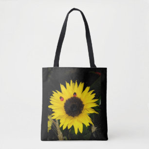 Gele zonnebloem en twee luikbeitjes tote bag