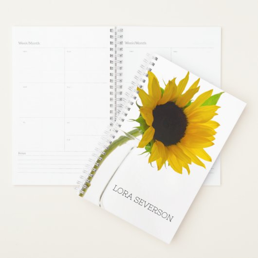 Gele zonnebloem op wit planner (Display)