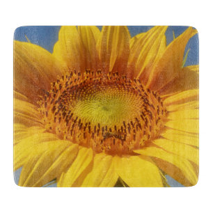 Gele zonnebloem snijplank