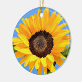 Gele zonnebloem tegen zon op blauwe hemel - zomer keramisch ornament (Links)
