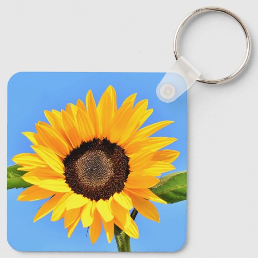 Gele zonnebloem tegen zon op blauwe hemel - zomer sleutelhanger (Achterkant)
