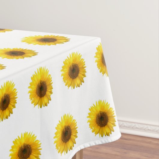Gele zonnebloemen op wit tafelkleed (Voorbeeld)