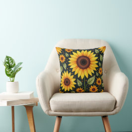 Gele zonnebloemen op zwart kussen