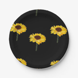 Gele zonnebloemen op zwart papieren bordje